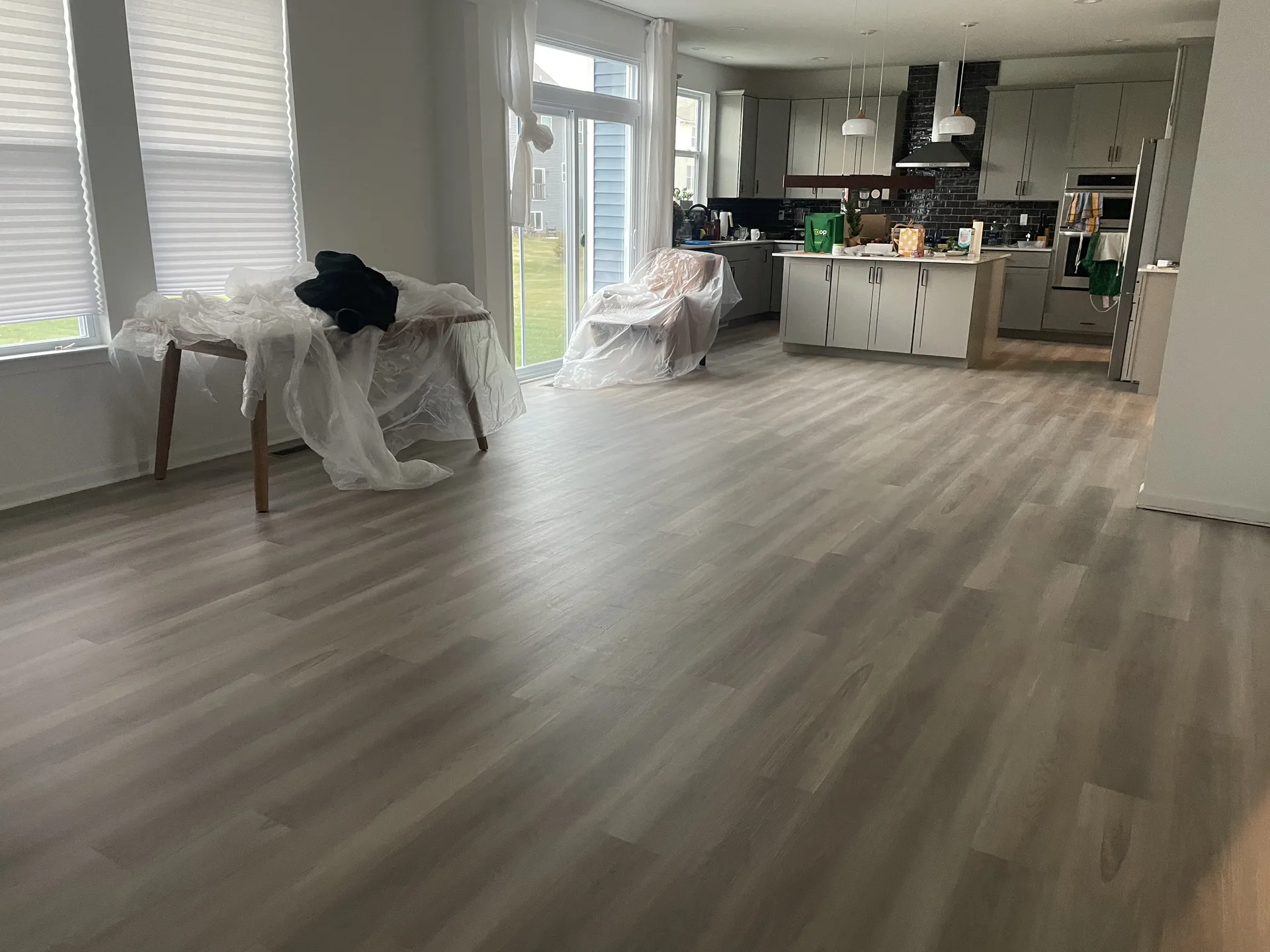 luxury vinyl flooring installed by BRC Flooring — kitchen & living