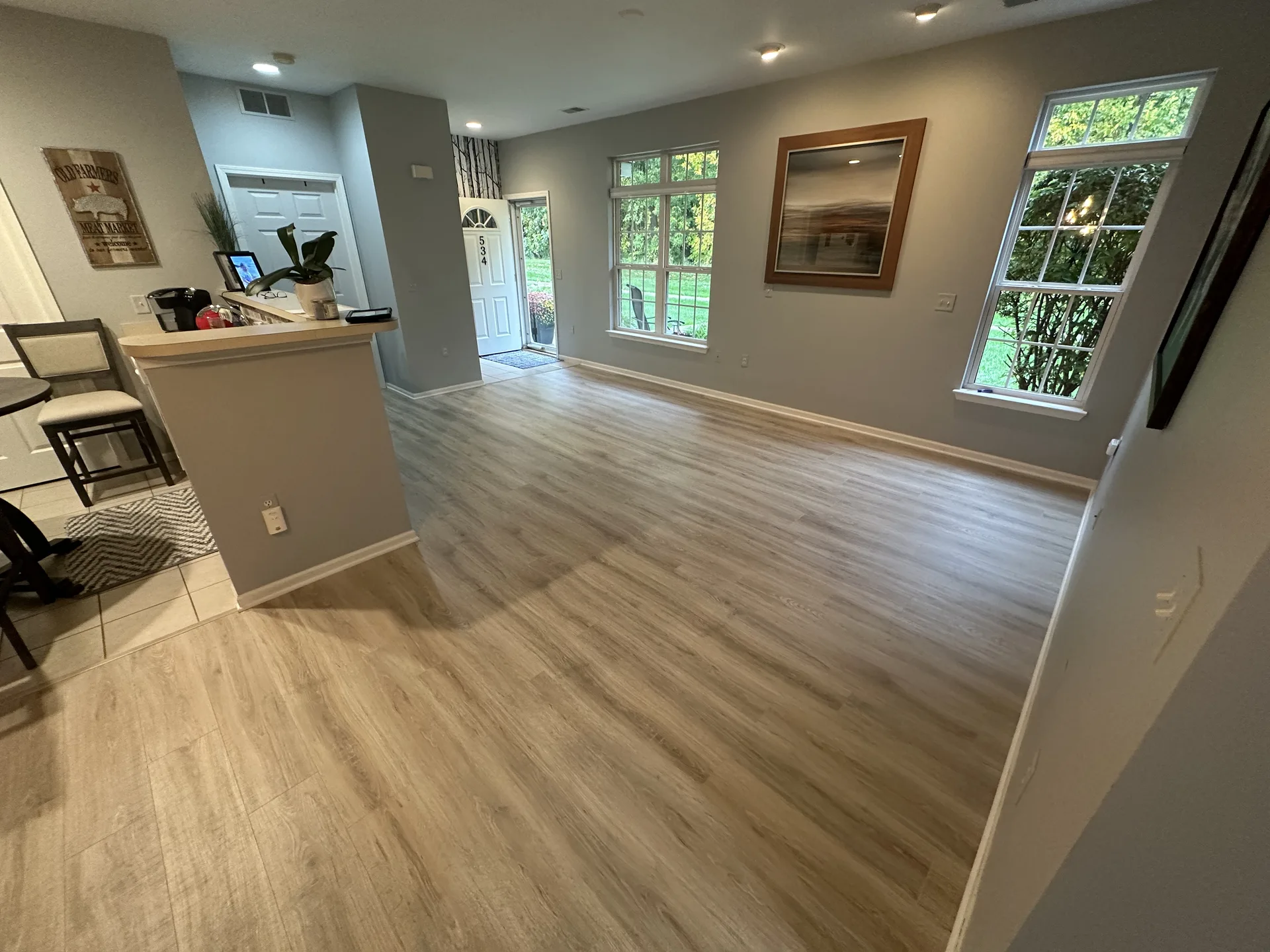 luxury vinyl flooring installed by BRC Flooring — entry & kitchen