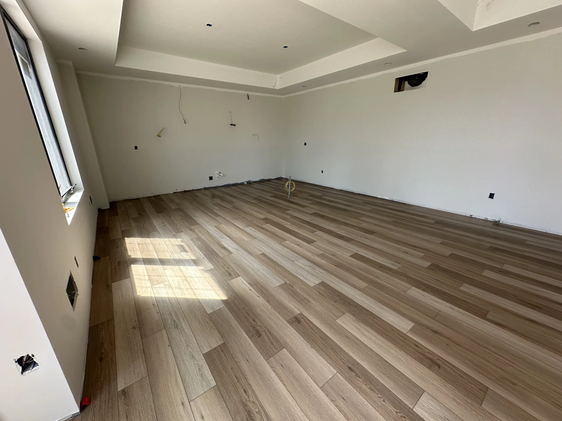 luxury vinyl flooring installed by BRC Flooring — new construction