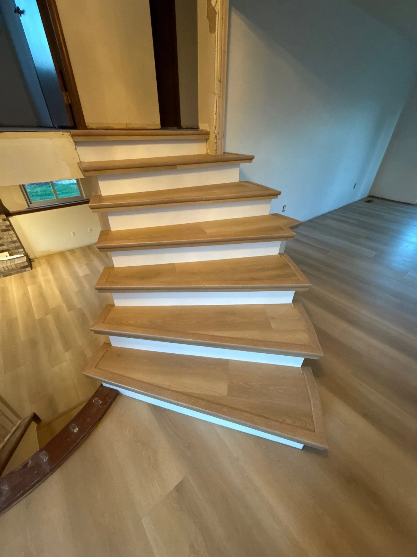 hardwood flooring installed by BRC Flooring — staircase · led lighting