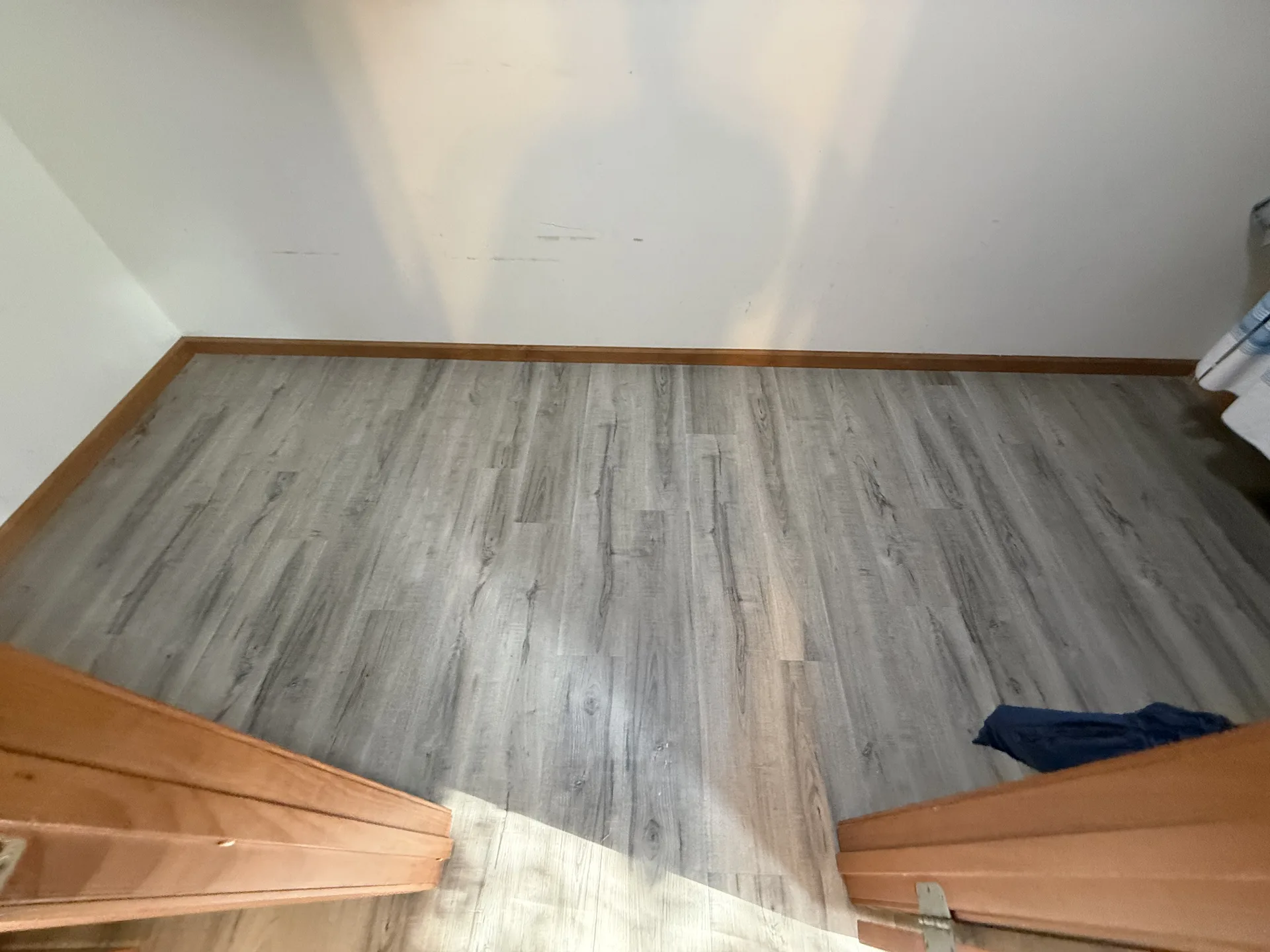 laminate flooring installed by BRC Flooring — bedroom