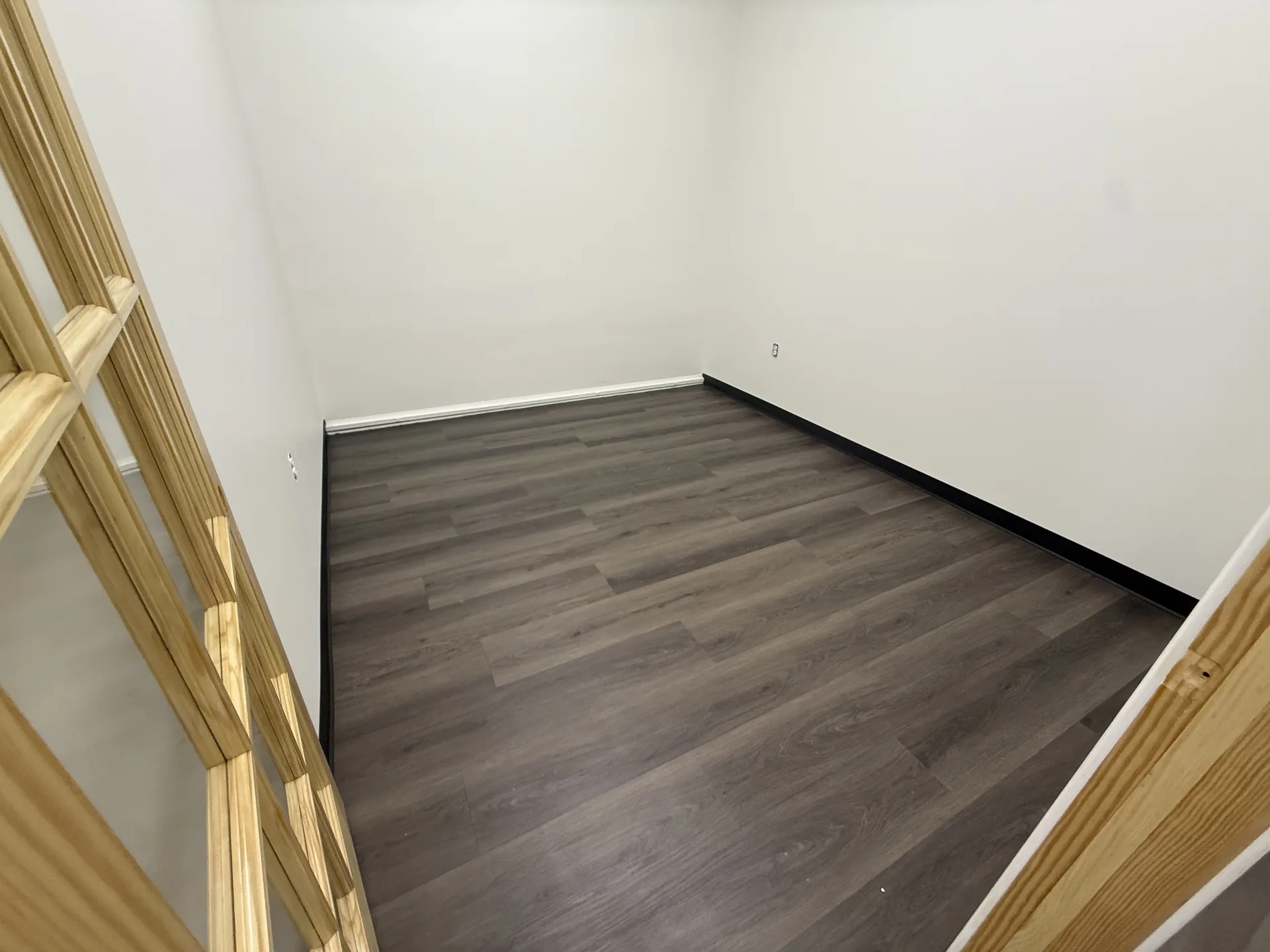 luxury vinyl flooring installed by BRC Flooring — finished basement